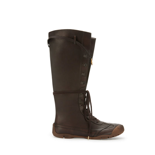Brown knee-high boot with lace-up design on a white background